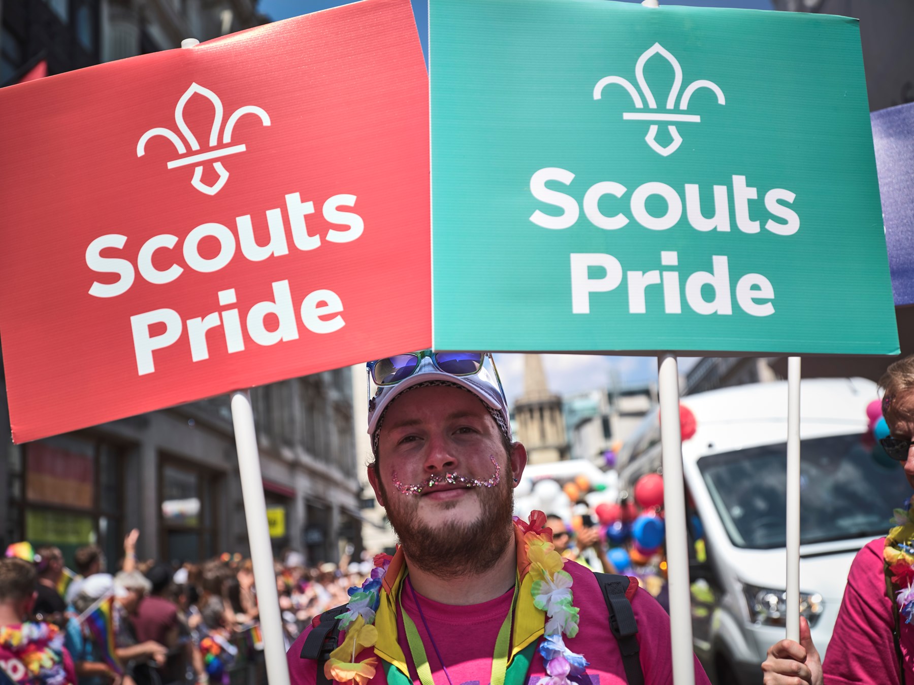 Scout Pride banners at a Pride parade