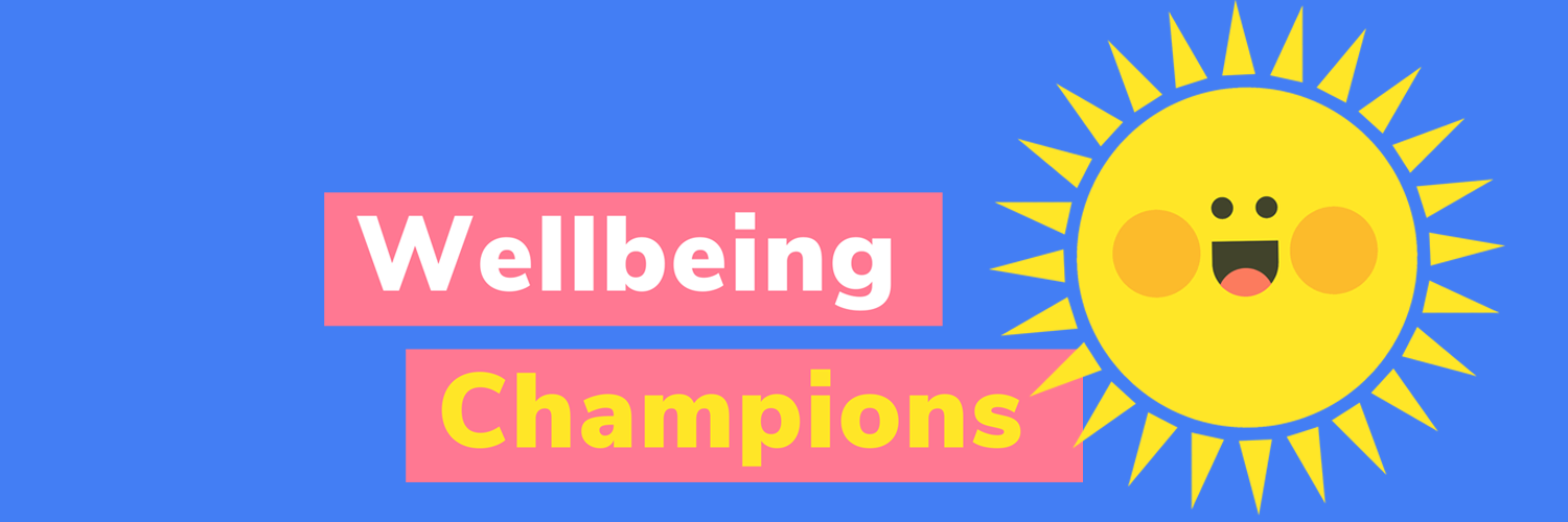 A sun with a wide smile next to the words "Wellbeing Champions"