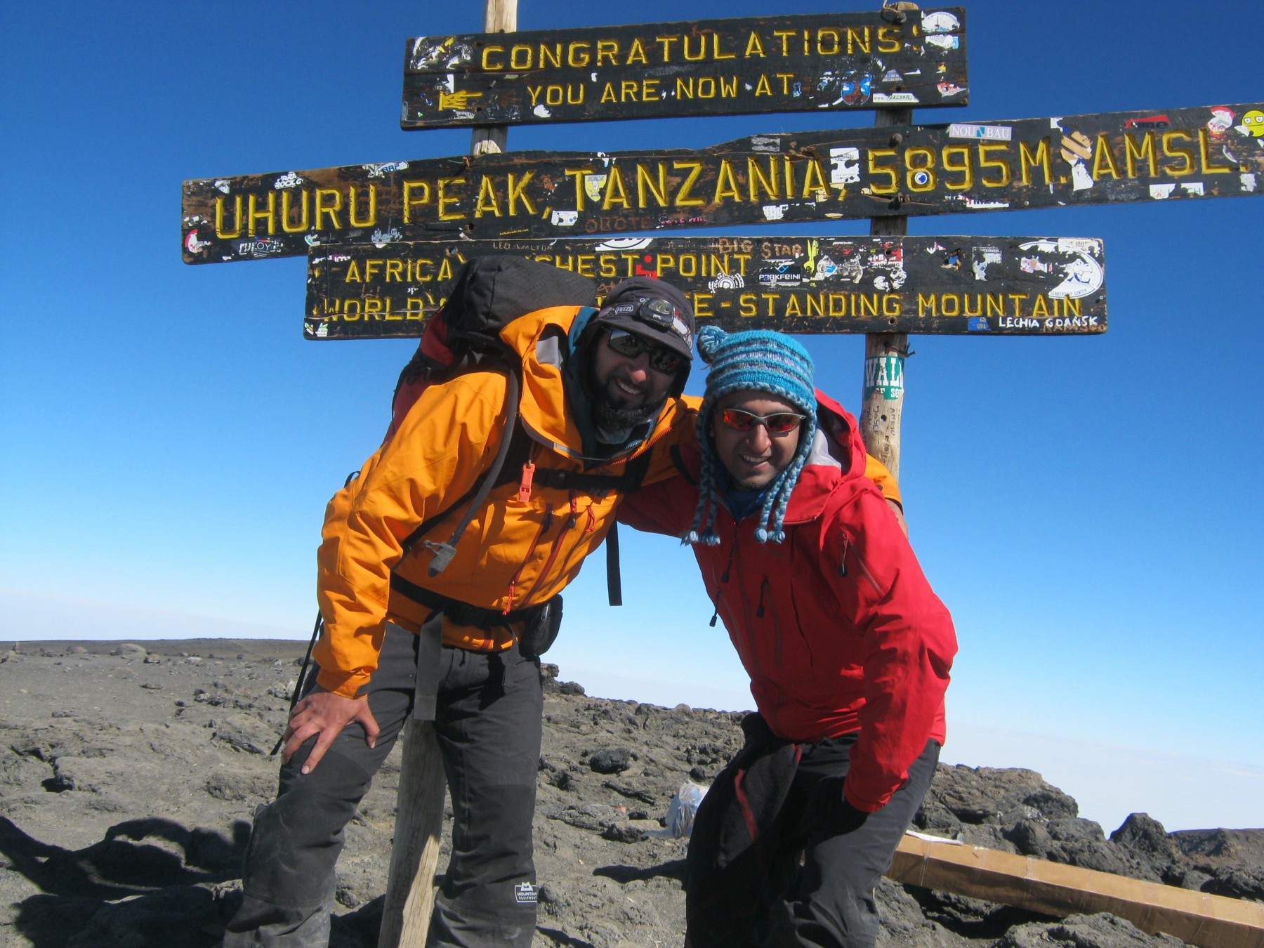 Mahroof with a friend at the top of Kilimanjaro