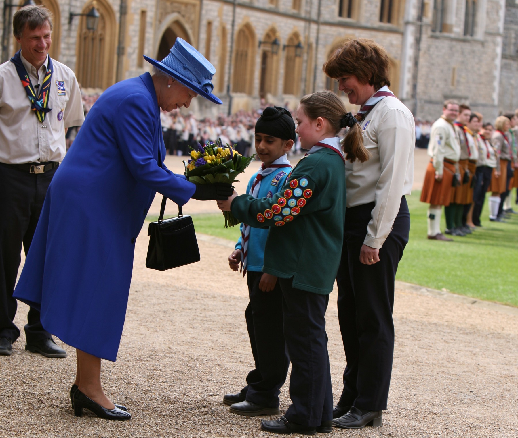 Photo of the Queen meeting Scout, Beaver and Cub