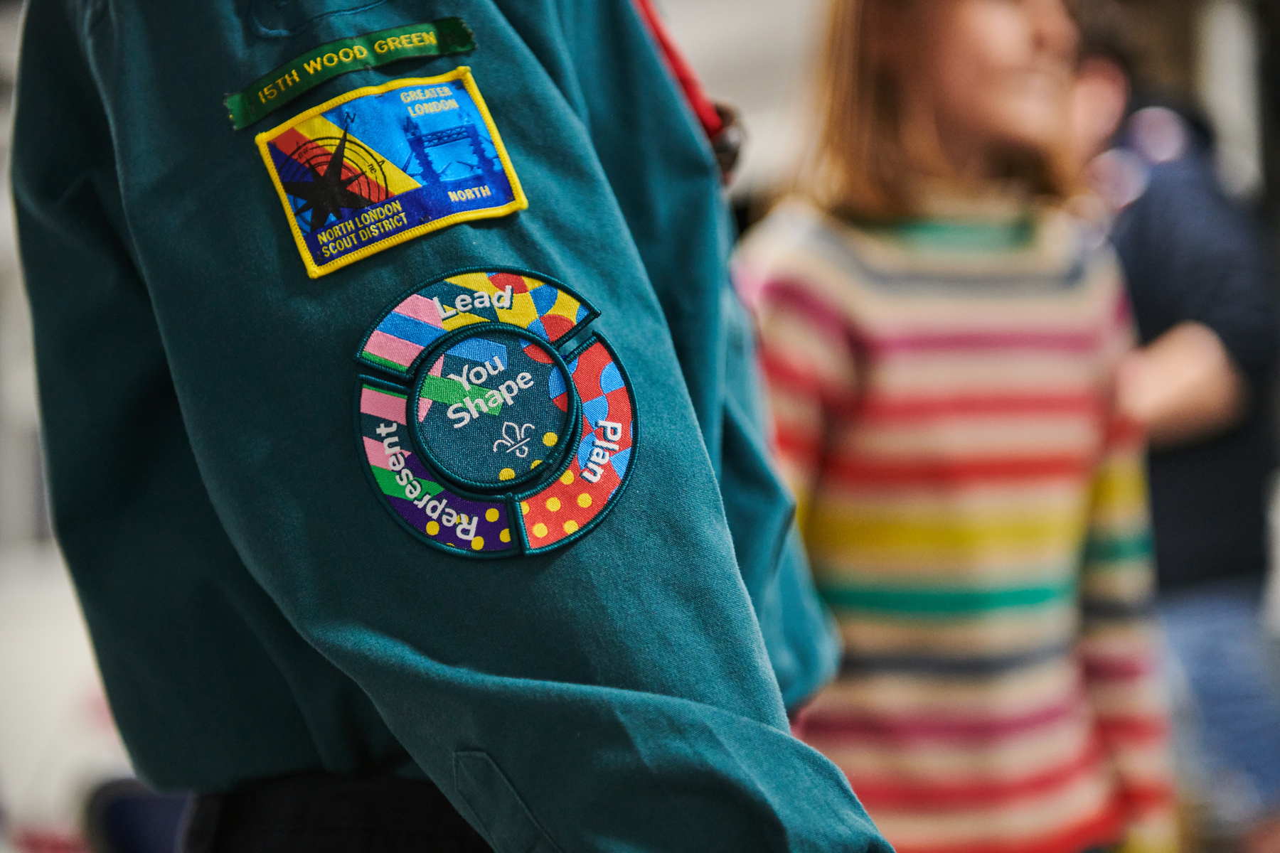 A picture of the Youshape award on a young person's uniform