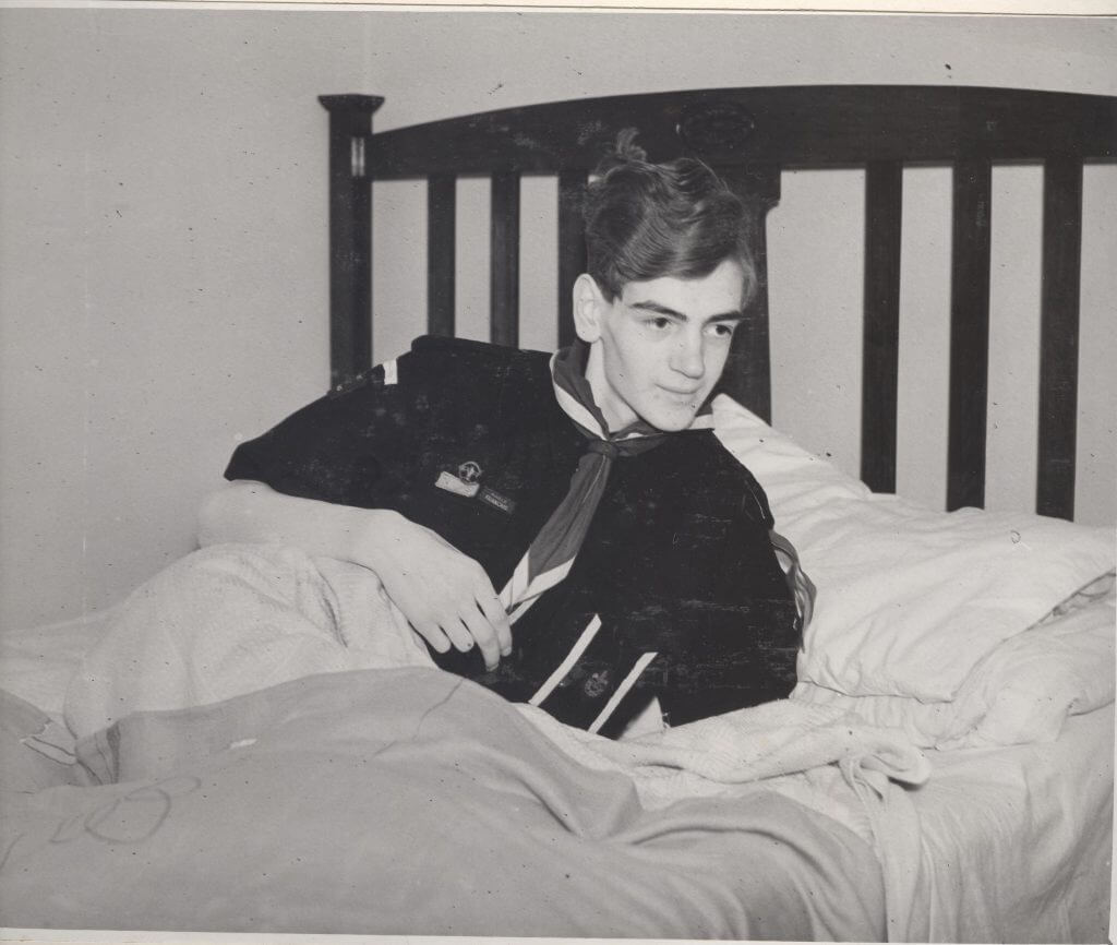 Image shows Albert Wheldale sitting up in bed