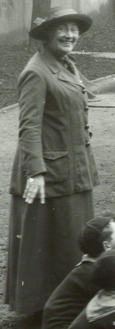 A Lady Cubmaster supervises a Wolf Cub Grand Howl, 1916