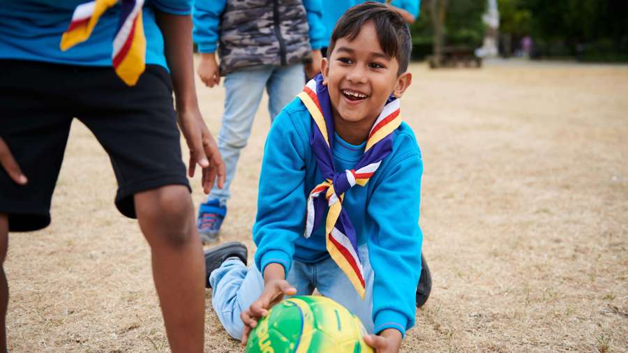 Young person taking part in an activity at Scouts