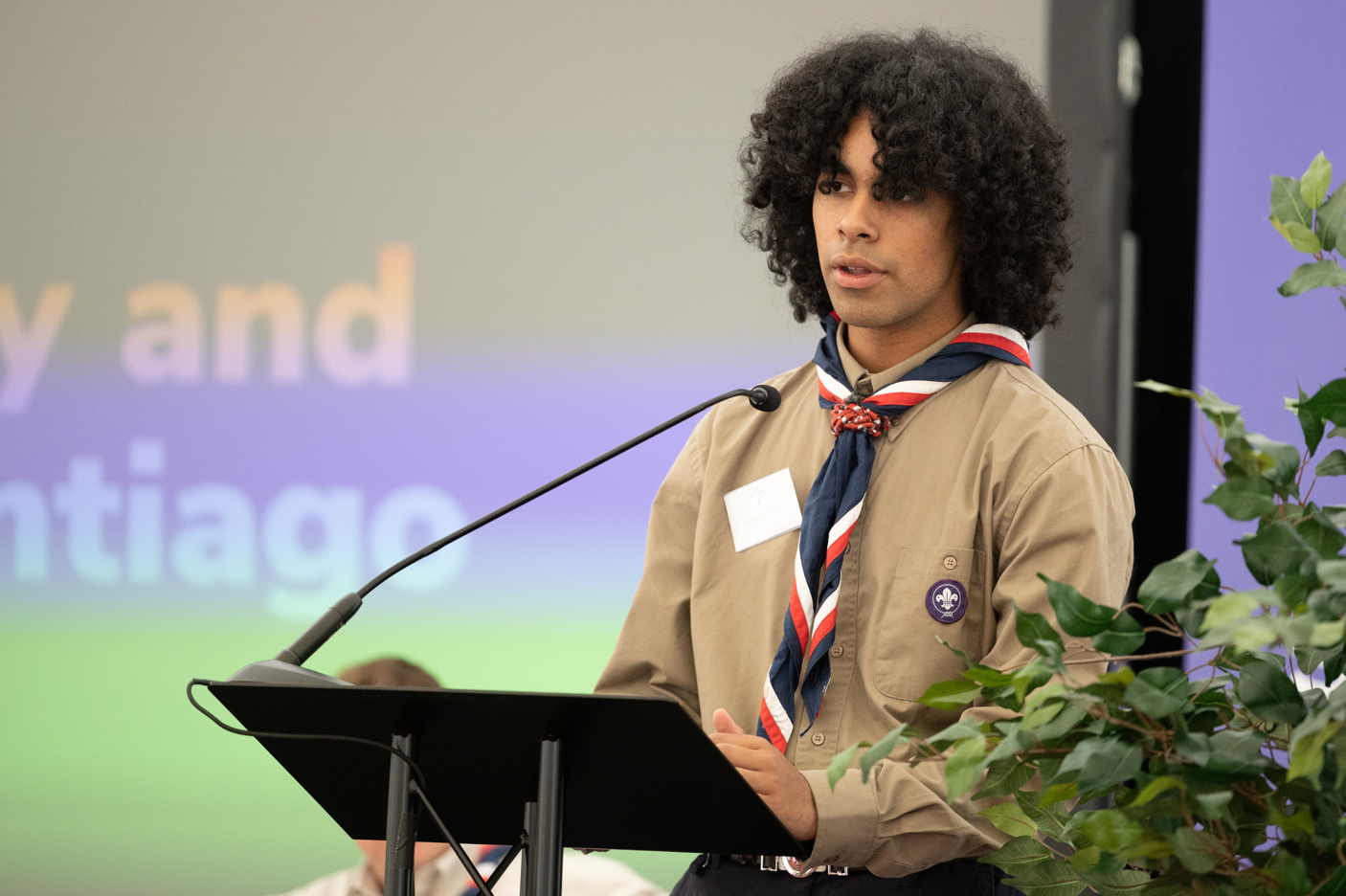 Santiago delivers his speech at Scouts' AGM