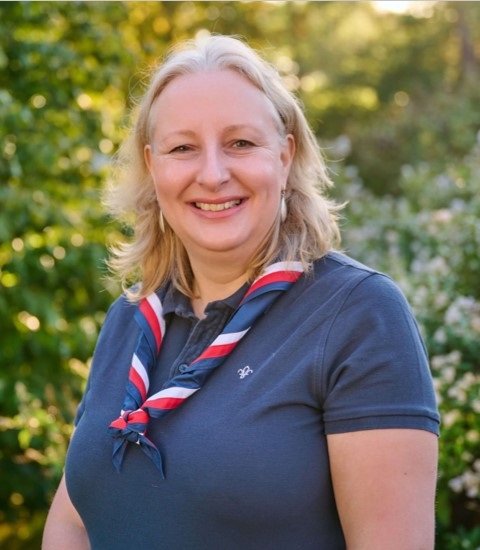 Kate Marks, a Scouts Board of Trustees member, in a garden at Gilwell Park