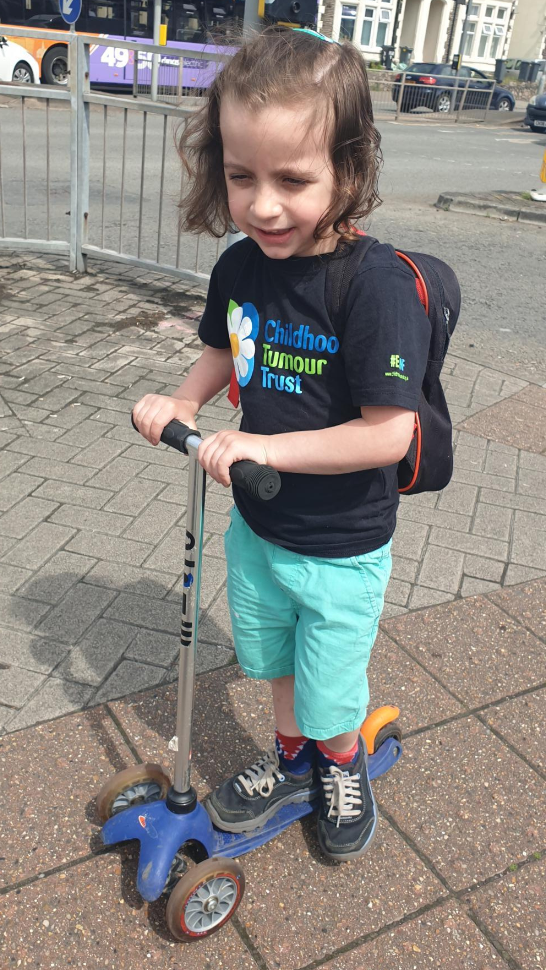 Eddie on his Scooter on the pavement