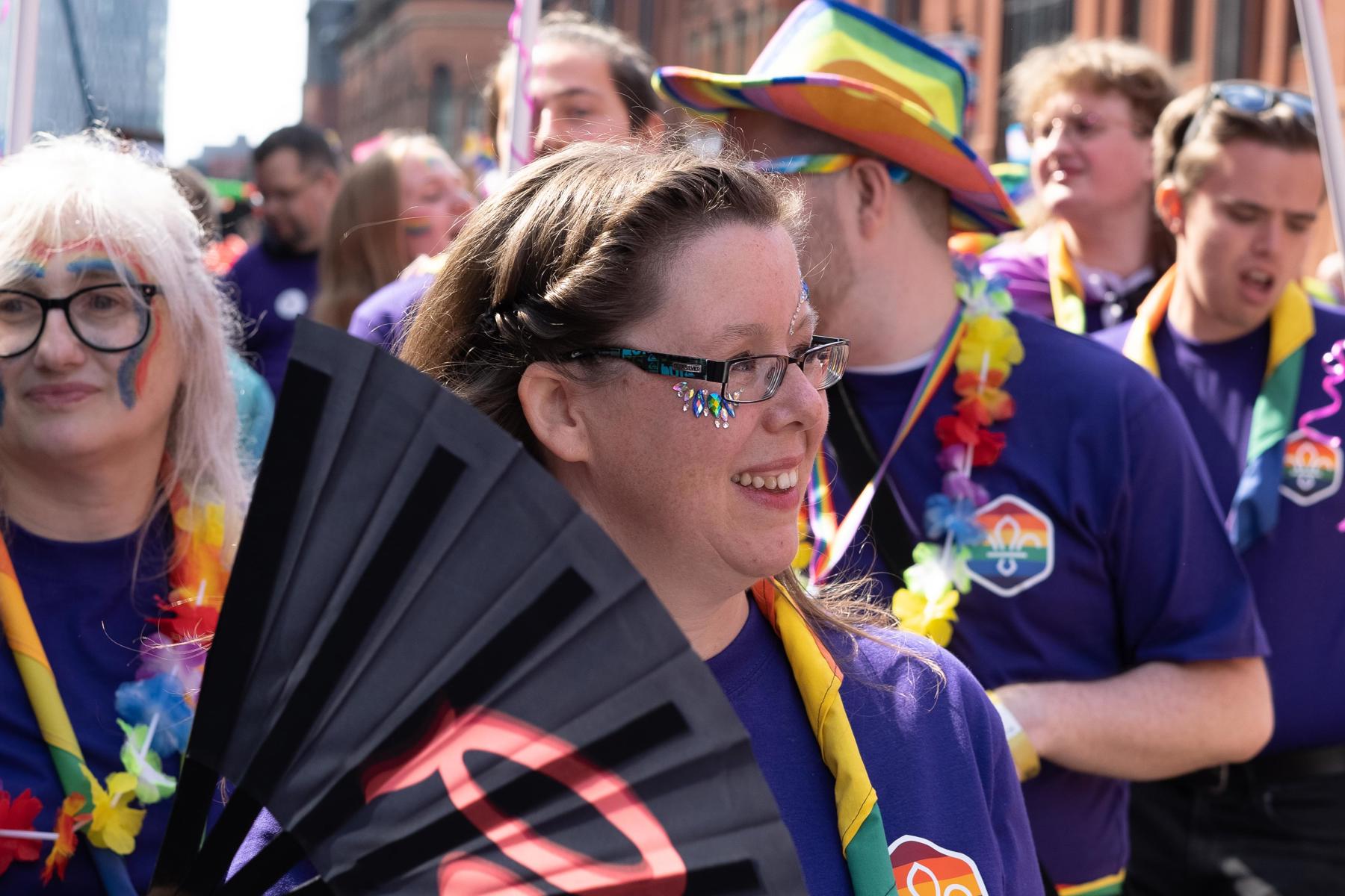 Katherine, a member of Scouts attending Pride and taking part in a pride parade