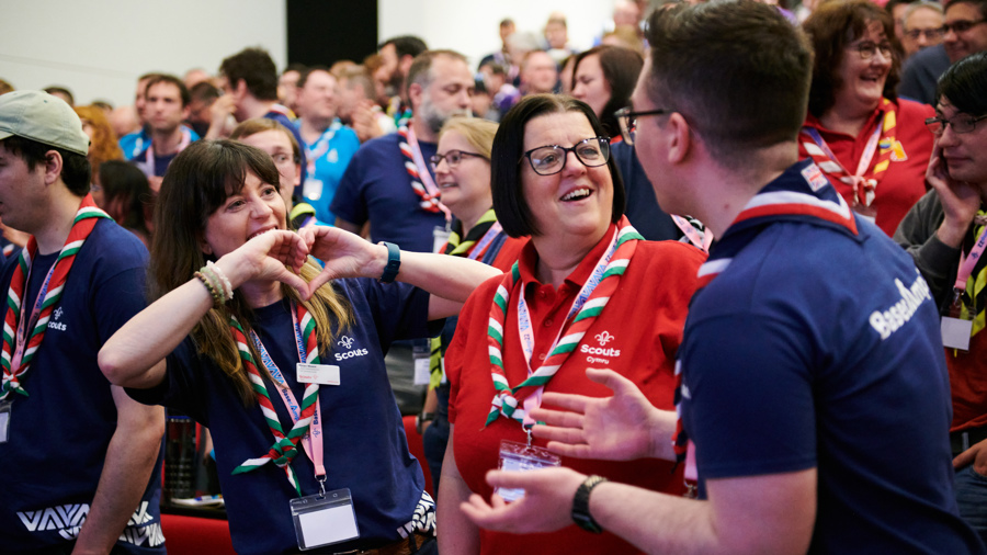 Adults and volunteers talking at Scouts