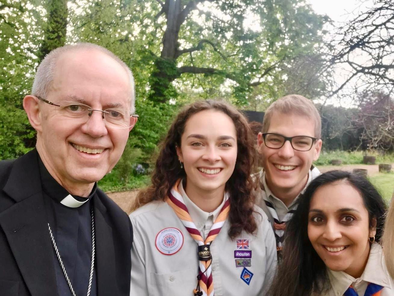 Three Scouts smiling with The Archbishop of Canterbury, Justin Welby