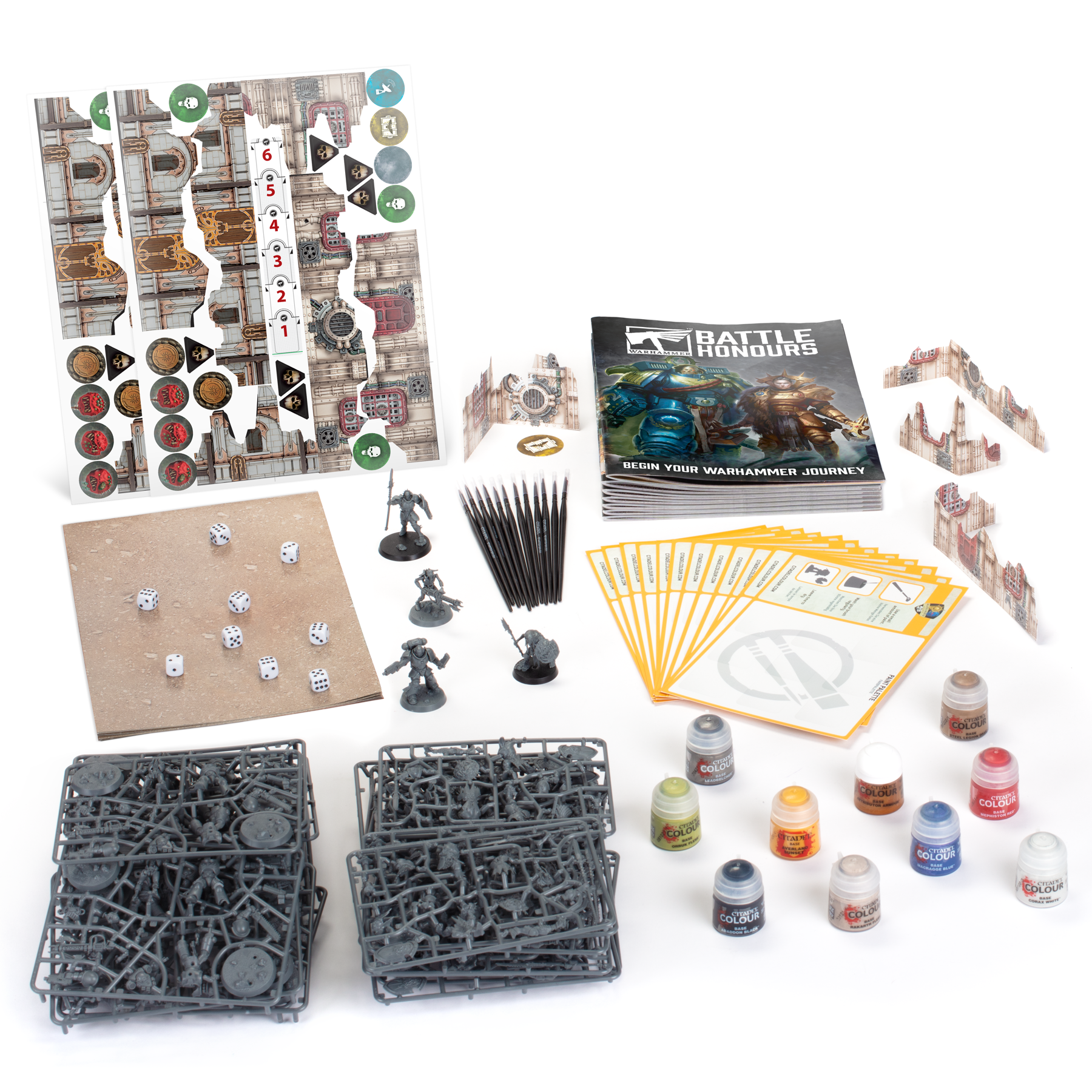 Contents inside the Warhammer box including two magazines, paint and models