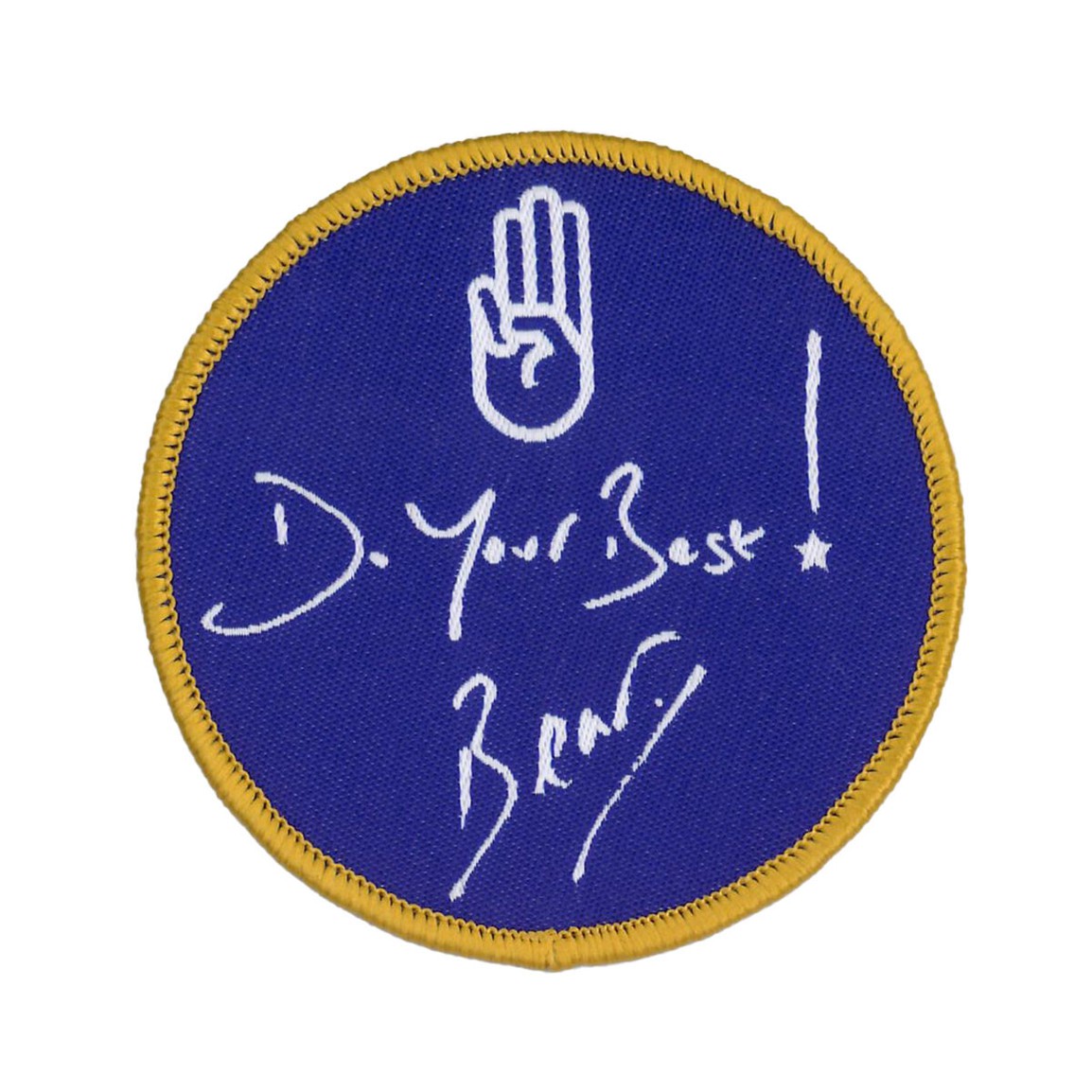 The image shows a navy badge with a gold border that says 'Do Your Best' with Bear's signature in white underneath. 