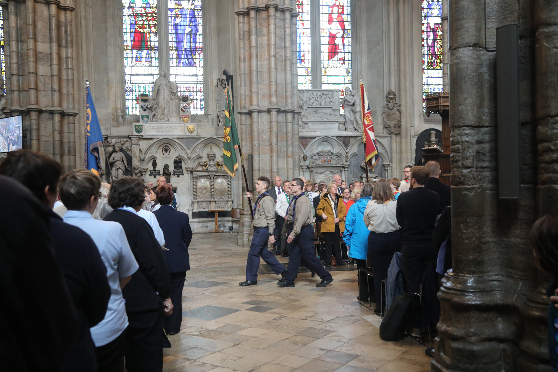 Scouts taking part in the flag parade at the Thanksgiving service in Westminster Abbey.