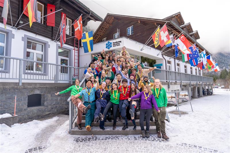 Scouts with flags in snow  