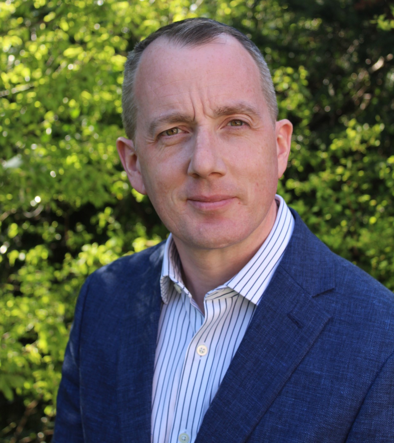 Matthew Killick, Scouts Executive Director of Operations, in a blue blazer and white shirt