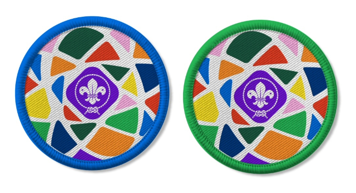 The image shows two badges. The left badge has a blue outline with a fleur-de-lis in the middle of multicoloured shapes. The badge on the right is the same but outlined in green.