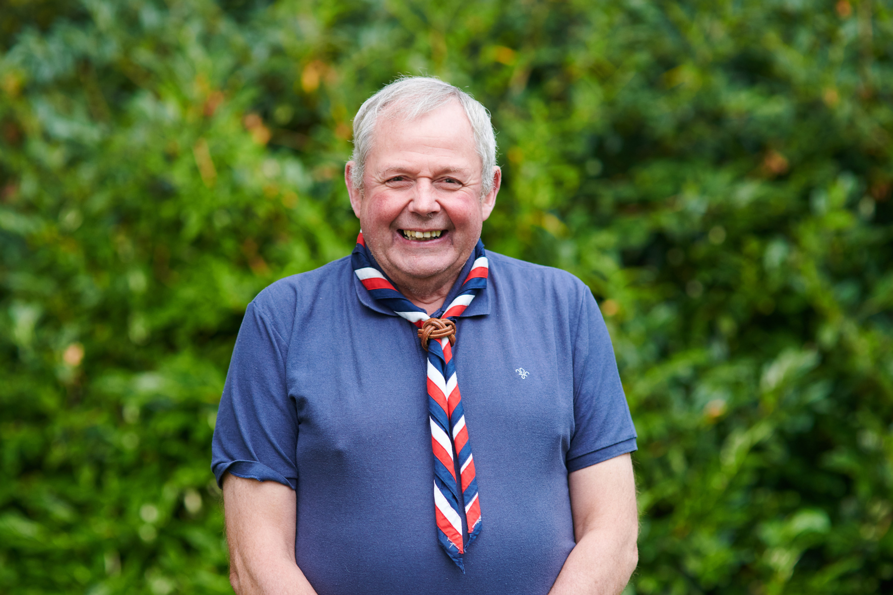 Image shows Northern Ireland as Chief Commissioner, Stephen Donaldson, in a necker at Gilwell Park