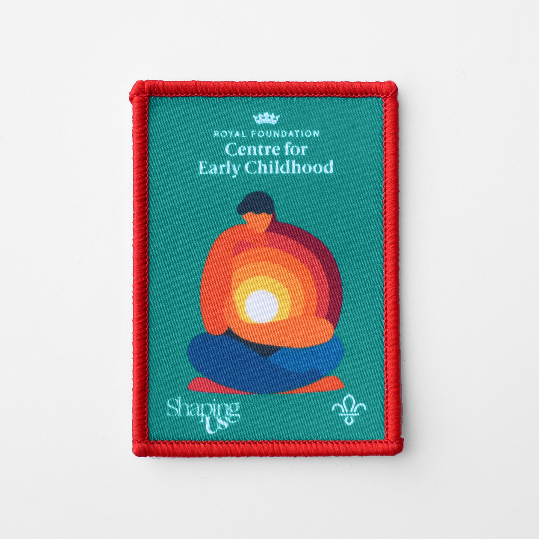 The Shaping Us blanket badge