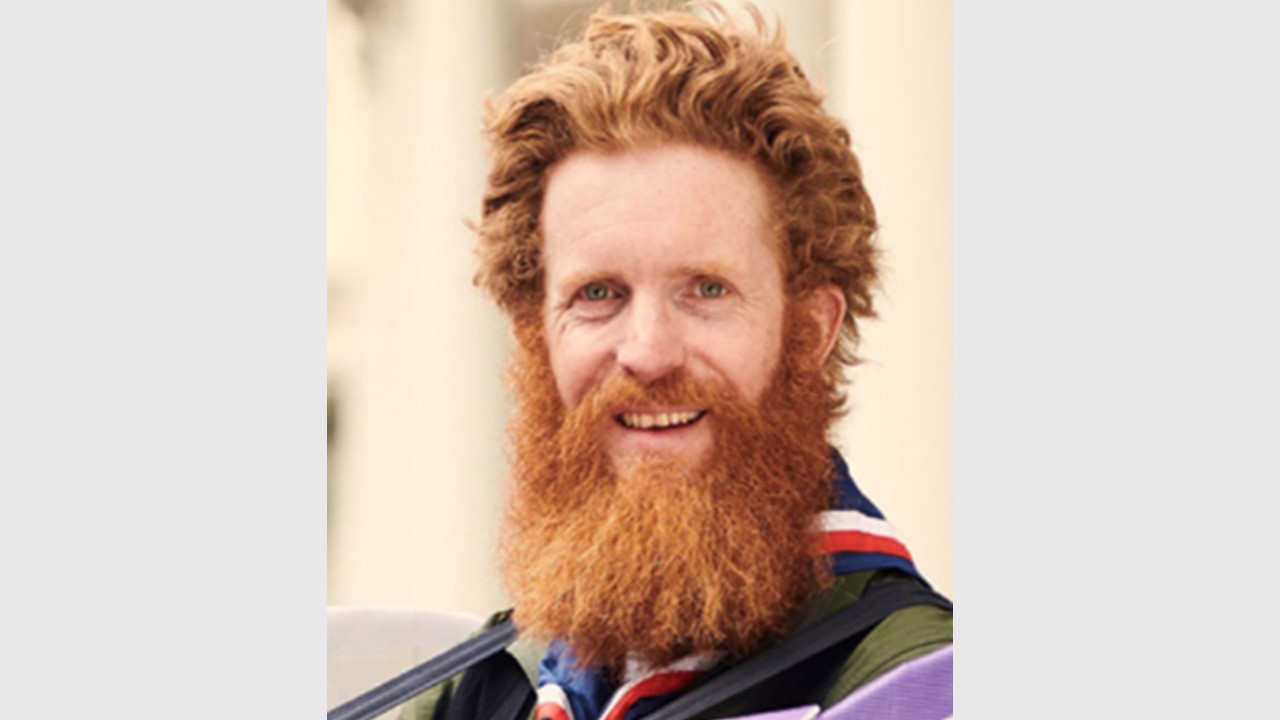 Man with ginger hair and large ginger beard