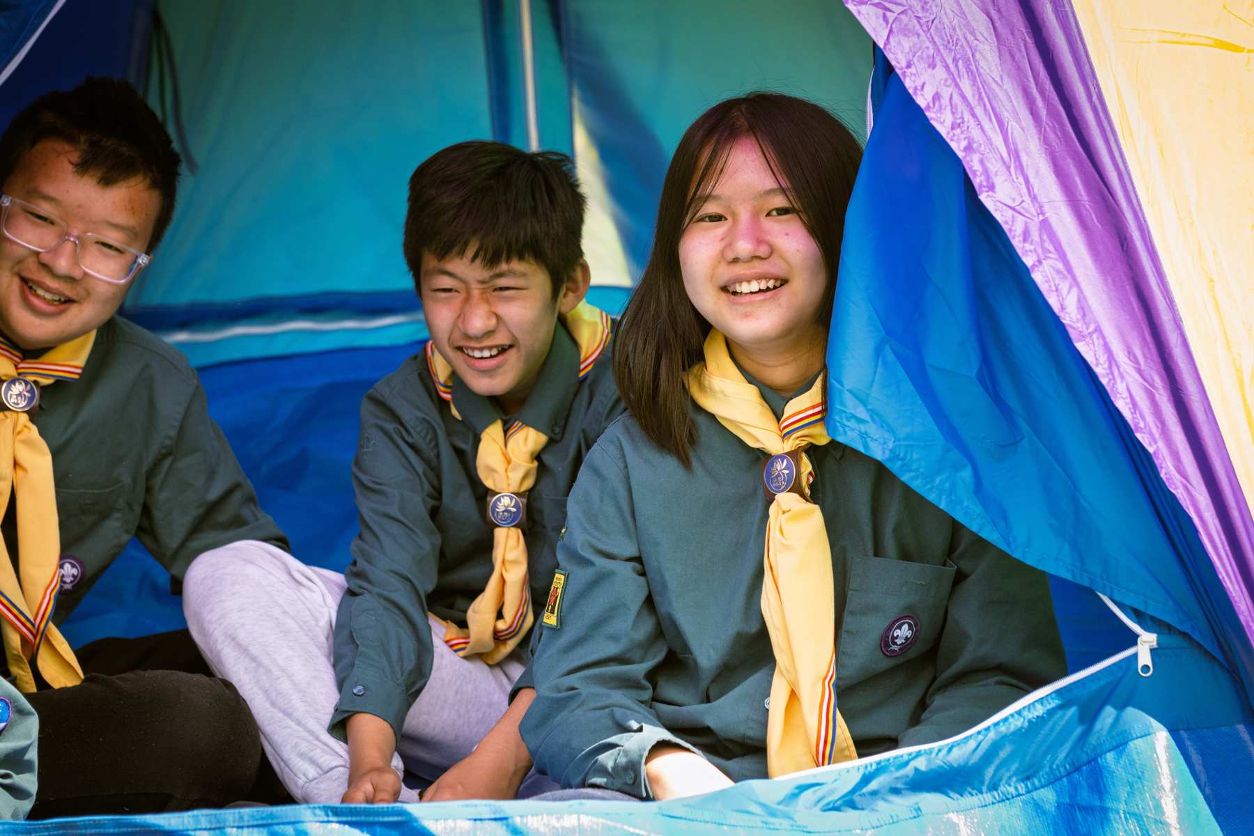 Three Scouts in tent