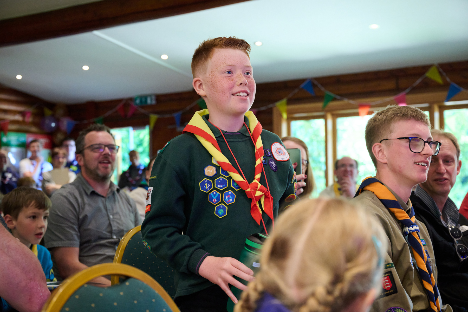 George standing up at the award ceremony, smiling in his Cubs uniform.