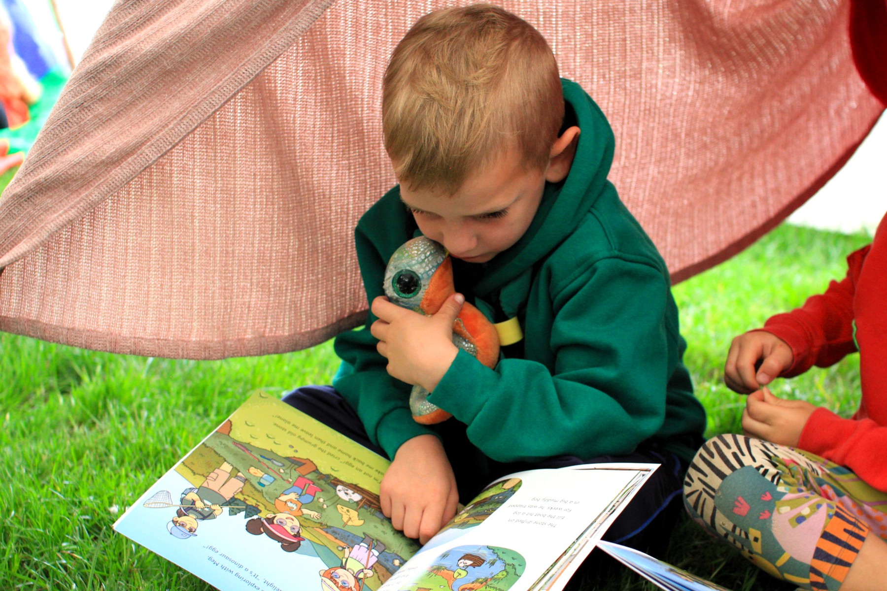 Squirrel reading The Grumpy Old Stone Book